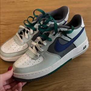 Nike Sneakers with Blue and Green Accents